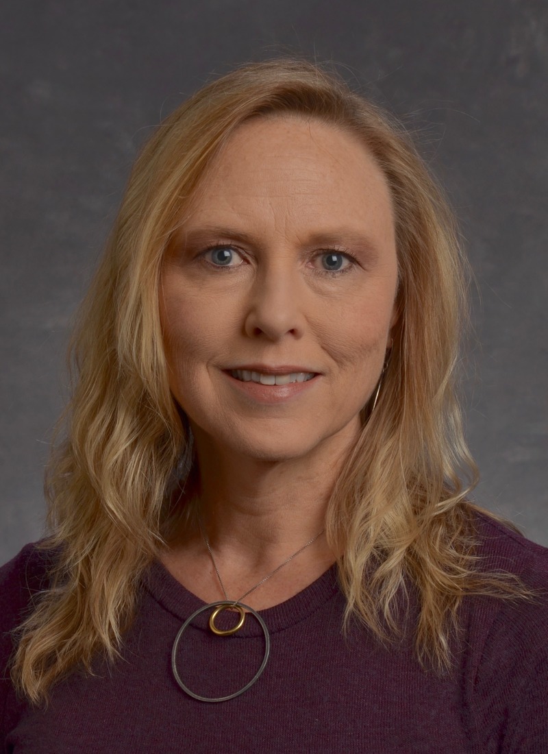 Dr. Kelly Hewett Promoted to Professor